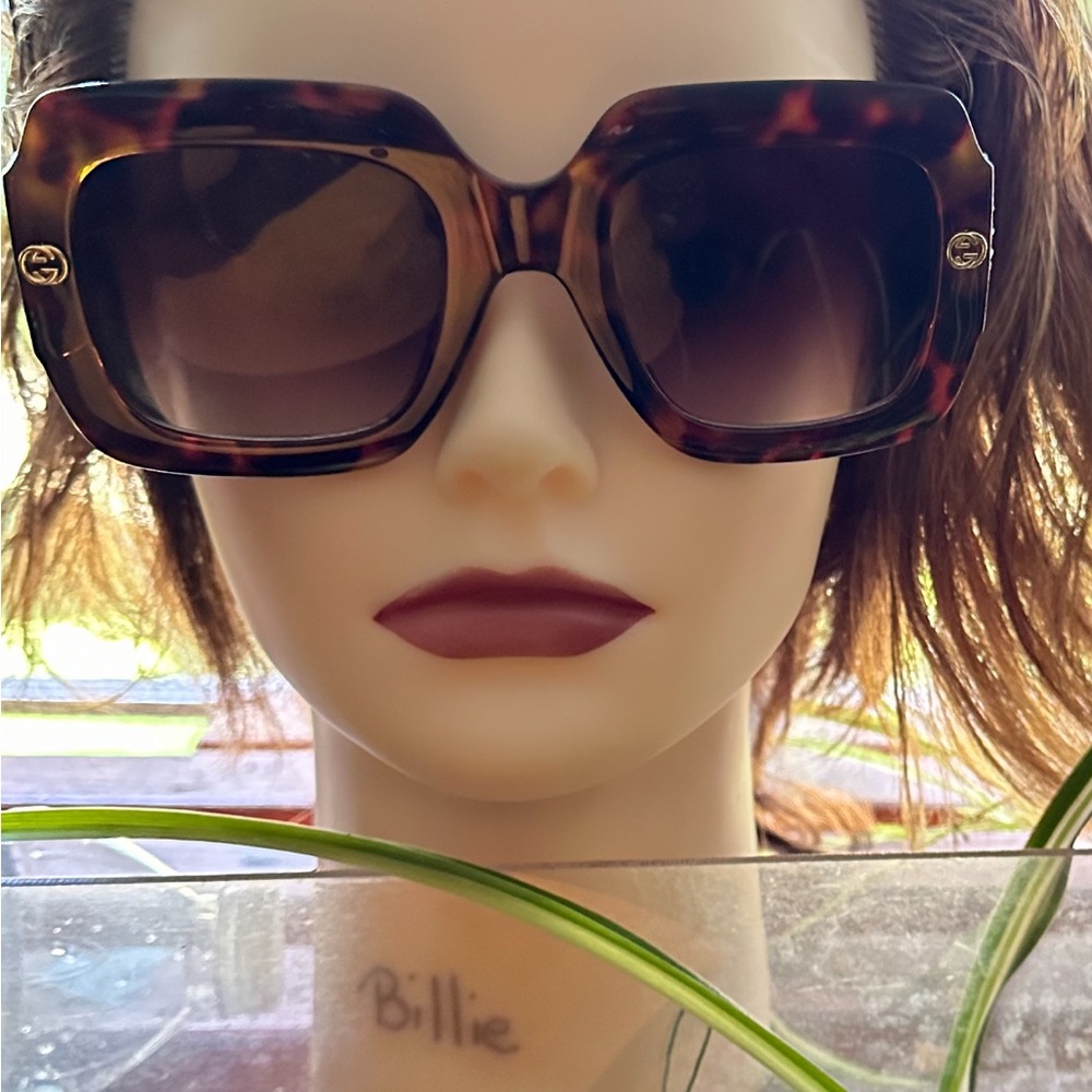 Gucci oversized sunglasses.